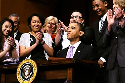 Obama signs healthcare bill